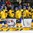GRAND FORKS, NORTH DAKOTA - APRIL 23: Sweden's Erik Brannstrom #14, Isac Lundestrom #17 and Tim Wahlgren #22 high five the bench after a first period goal against Canada during semifinal round action at the 2016 IIHF Ice Hockey U18 World Championship. (Photo by Matt Zambonin/HHOF-IIHF Images)

